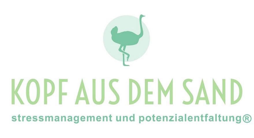KOPF AUS DEM SAND